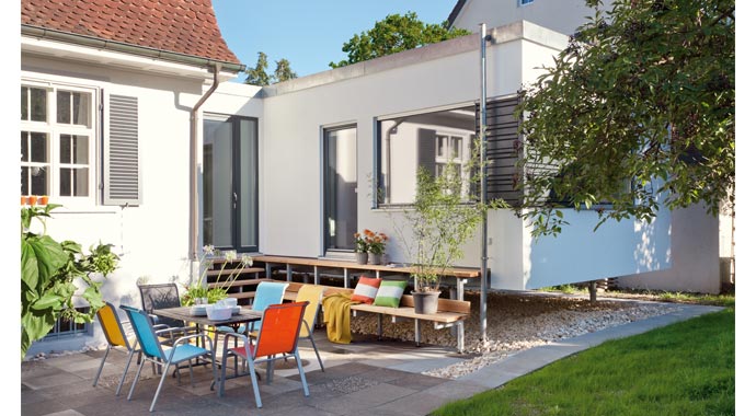 SchwörerHaus Anbau Dergeloo - FlyingSpace Außenansicht &  Terrasse