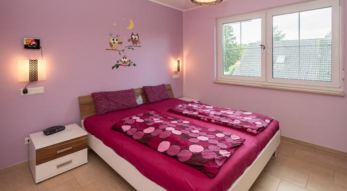 Roth-Massivhaus Stadtvilla als Doppelhaus Schlafzimmer