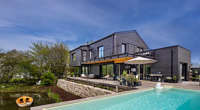 GRIFFNER Classic mit Flachdachzubau. Foto: Griffnerhaus