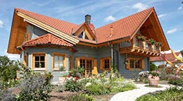 Bauen mit Holz Außenansicht Blockhaus Burgstall von Rems-Murr-Holzhaus