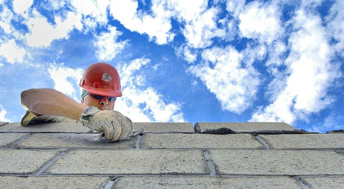 Symbolbild Maurer bei der Arbeit Symbolbild Maurer bei der Arbeit