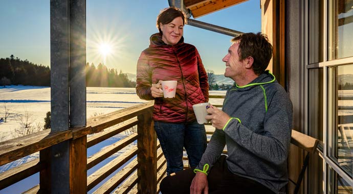 Familie Madlener auf dem Balkon ihres Eigenheims Familie Madlener auf dem Balkon ihres Eigenheims