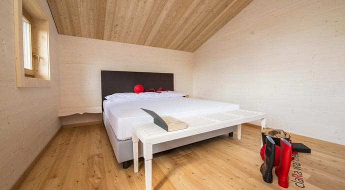 Rubner Haus Blockhaus Clara Schlafzimmer